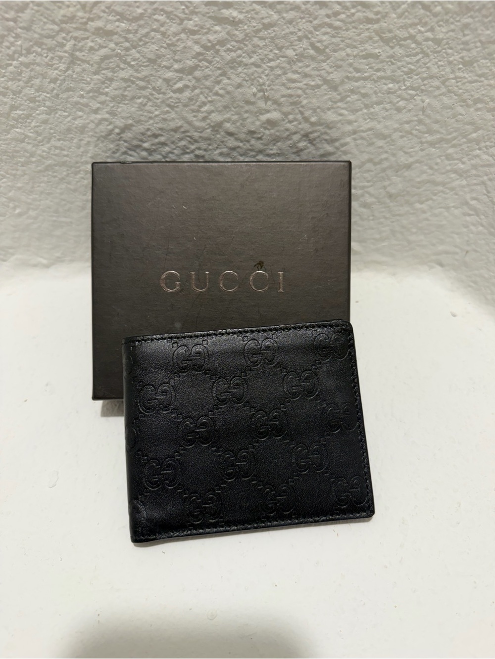 Gucci Black Embossed GG Leather Wallet